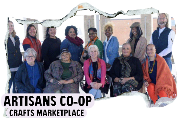 A group of 13 people are sitting and standing together as members of Artisans Co-op Crafts Marketplace, one of the Remember The Future Fellows selected by Art.Coop 