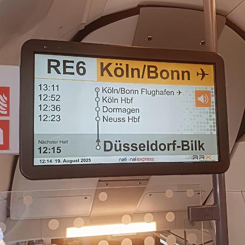 Sign inside the train showing the destination of Köln