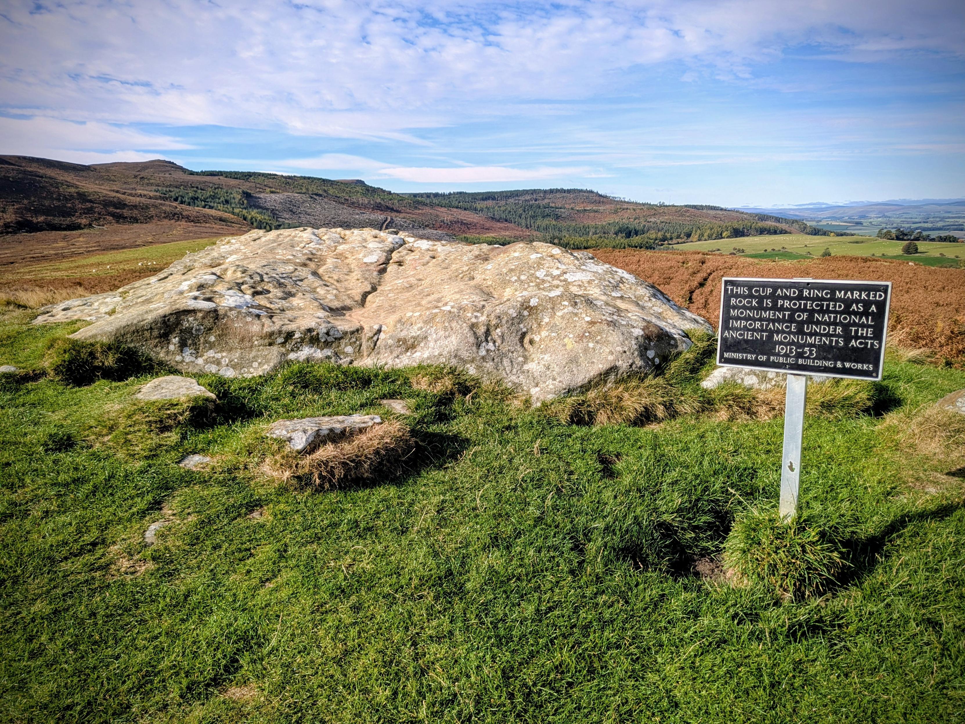 Sign mentioning cup and ring-marked stone is a scheduled monument